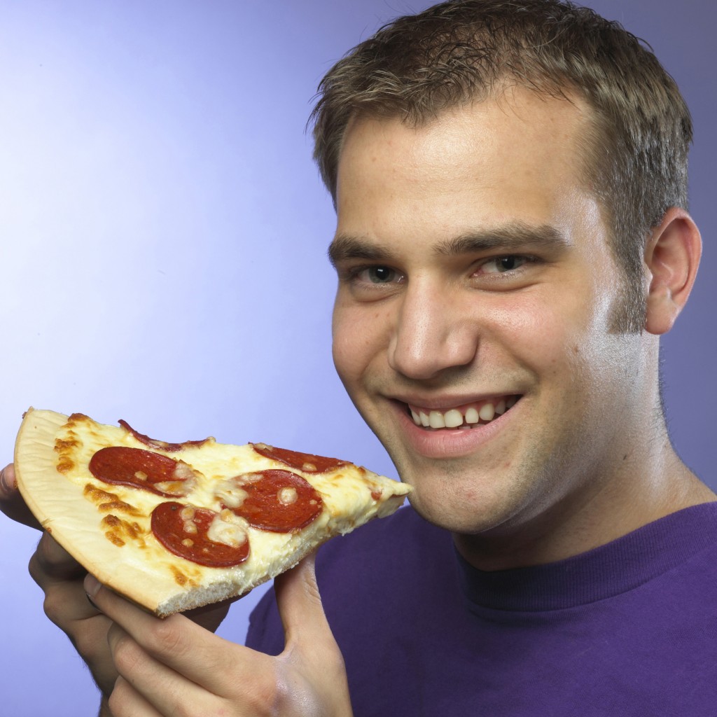 Man Eating Pizza