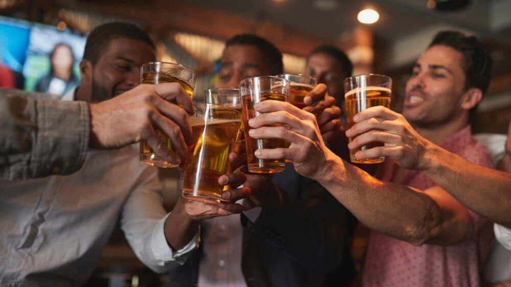 Male Friends Drinking Bar