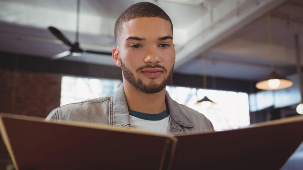 Man reading menu