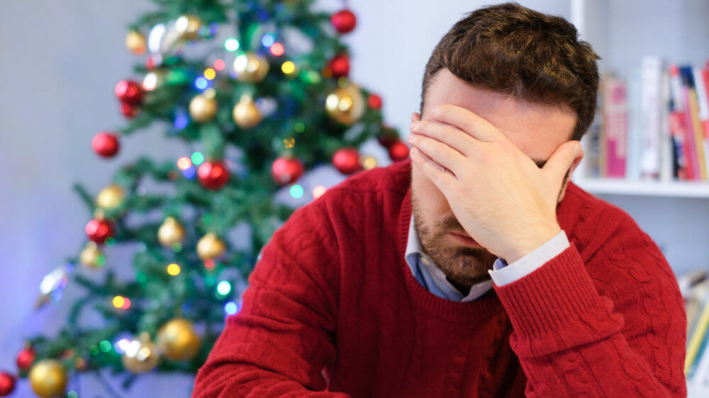 Sad man upset at Christmas