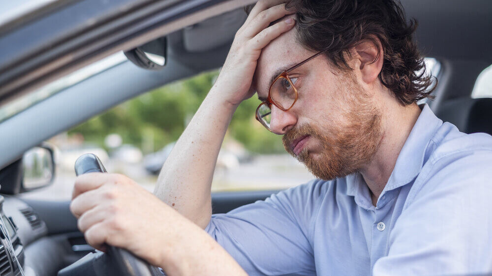 Frustrated man driving