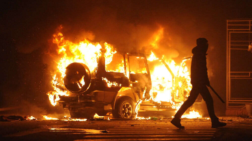 Burning car riot