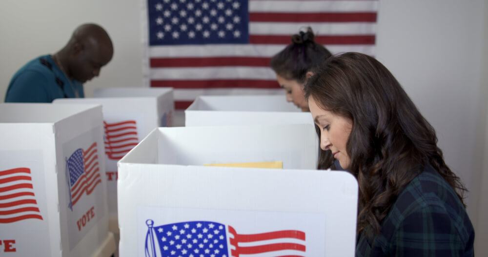 People at voting booth