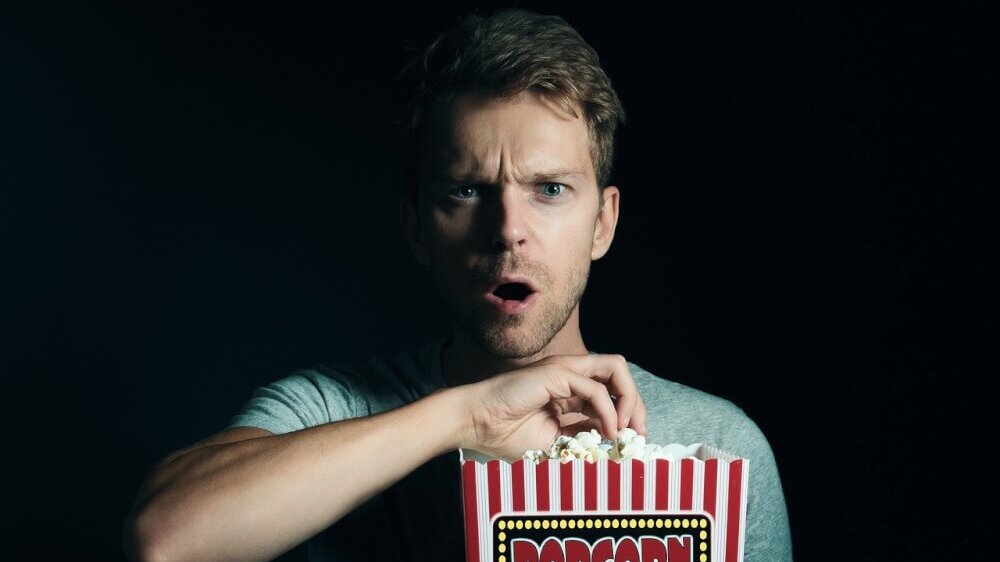 Guy Eating Popcorn